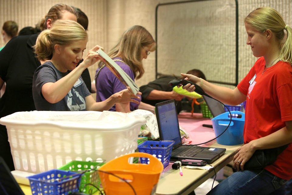 volunteers at checkout